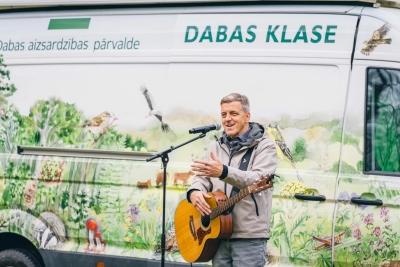 Kārlis Kazaks with guitar