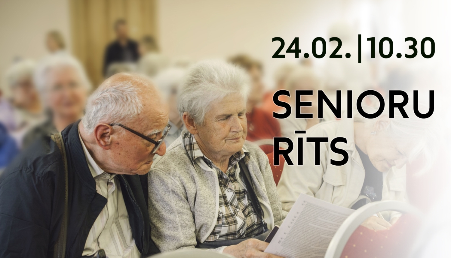 Sirmgalvji lasa dokumentus telpā ar citiem cilvēkiem un informācija par pasākumu "Senioru rīts" 24. februārī plkst. 10.30.